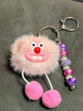 Quirky Pink Monster Pom-Pom Keychain with Googly Eyes