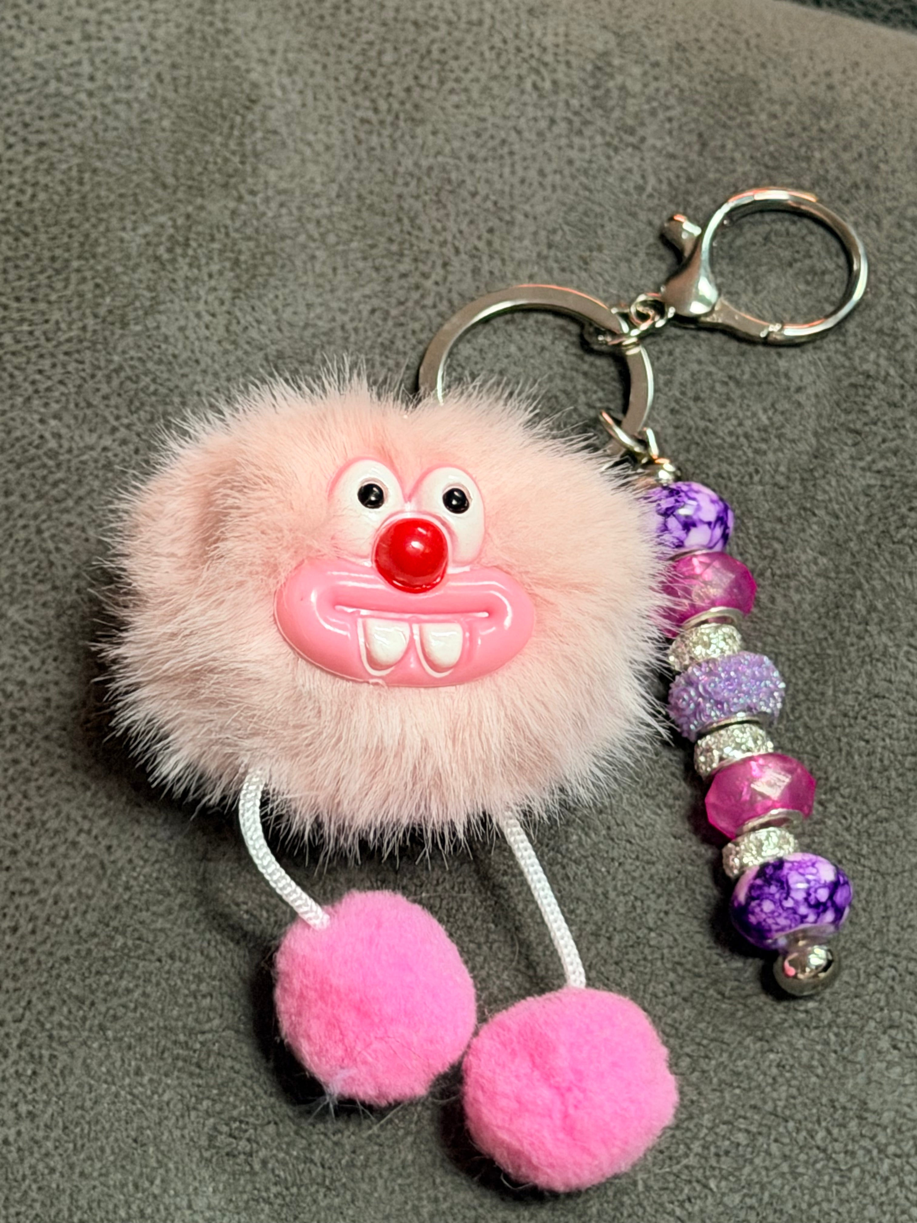 Quirky Pink Monster Pom-Pom Keychain with Googly Eyes